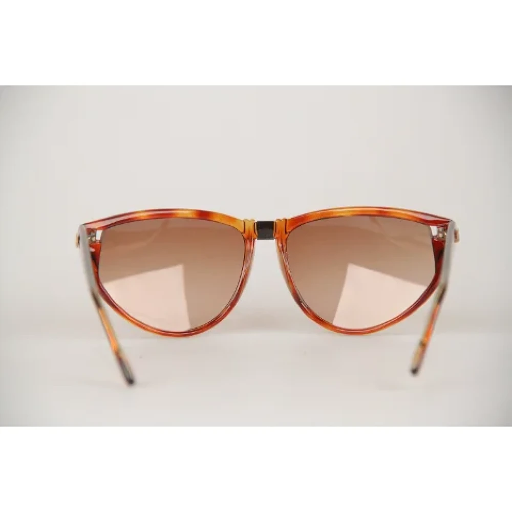 Givenchy Pre-owned Plastic sunglasses Brown Dames
