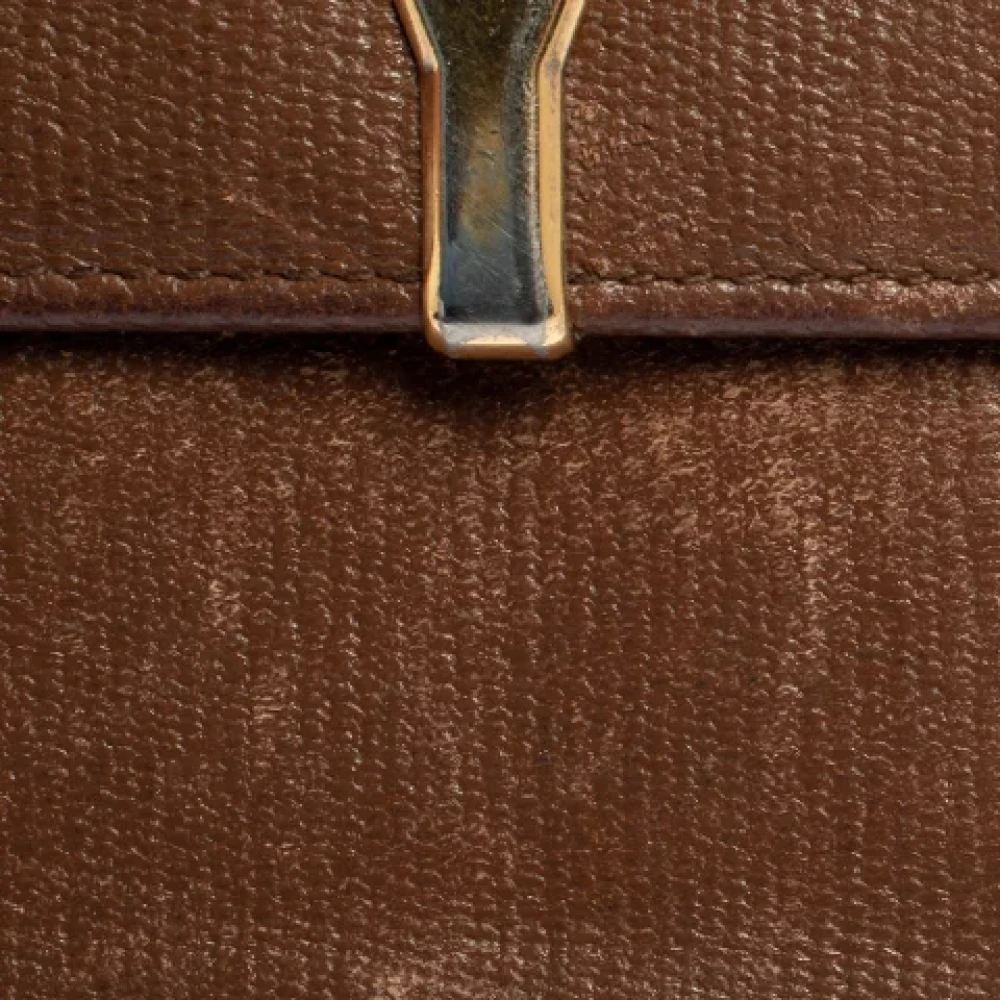 Yves Saint Laurent Vintage Pre-owned Leather wallets Brown Dames