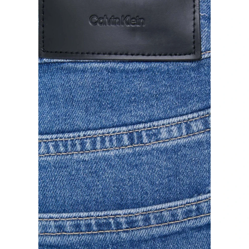Calvin Klein High Rise Tapered Jeans in Blauw Blue Dames