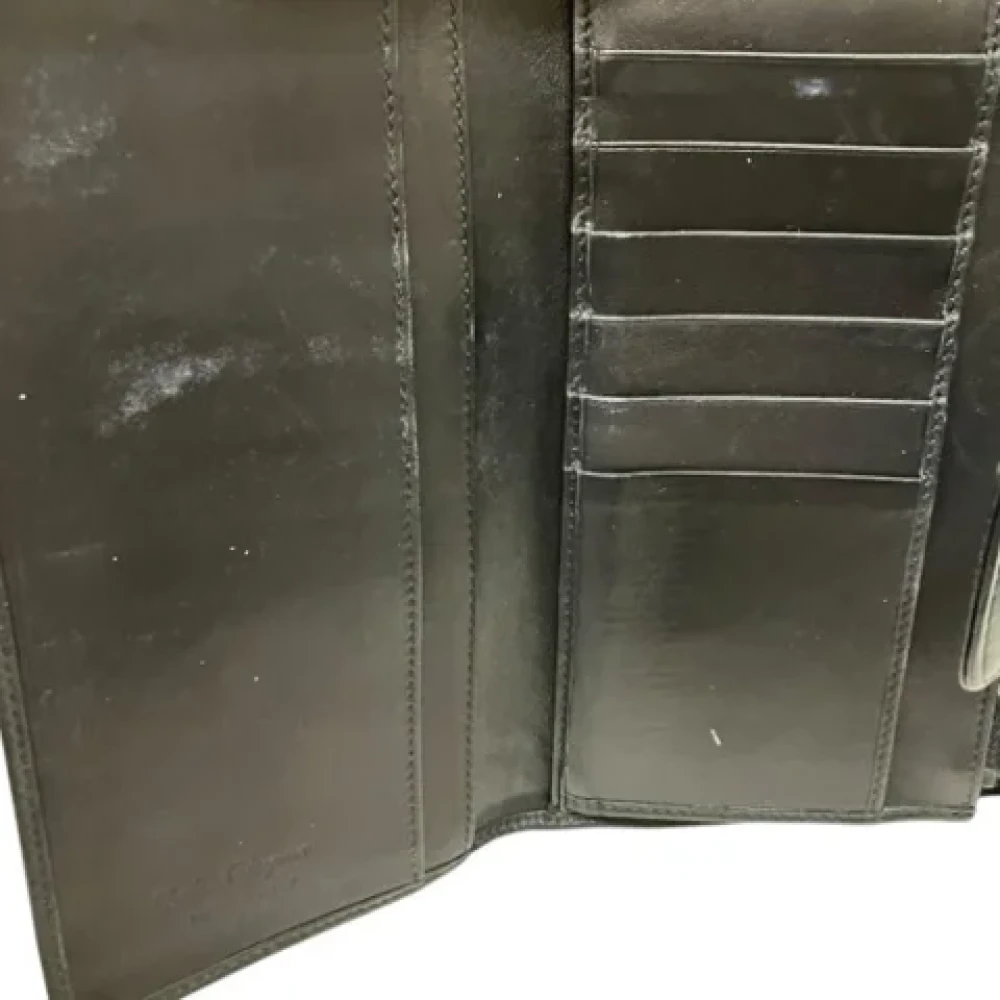 Salvatore Ferragamo Pre-owned Leather wallets Black Unisex