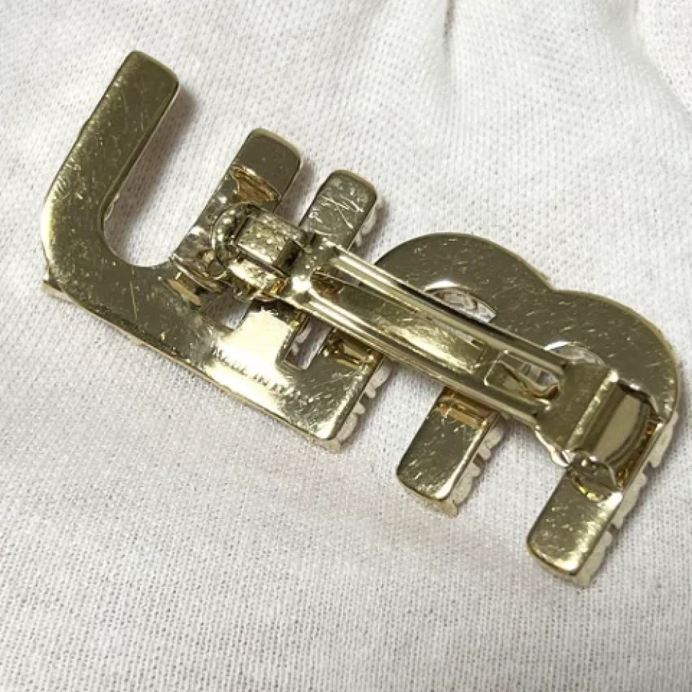 Miu Pre-owned Metal hair-accessories Yellow Dames