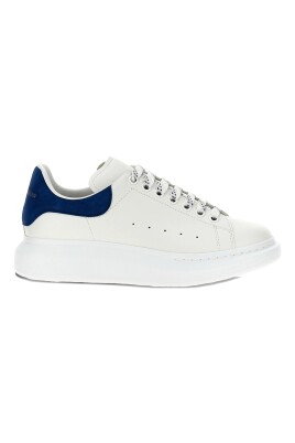 white-sneakers-with-blue-suede-spoiler