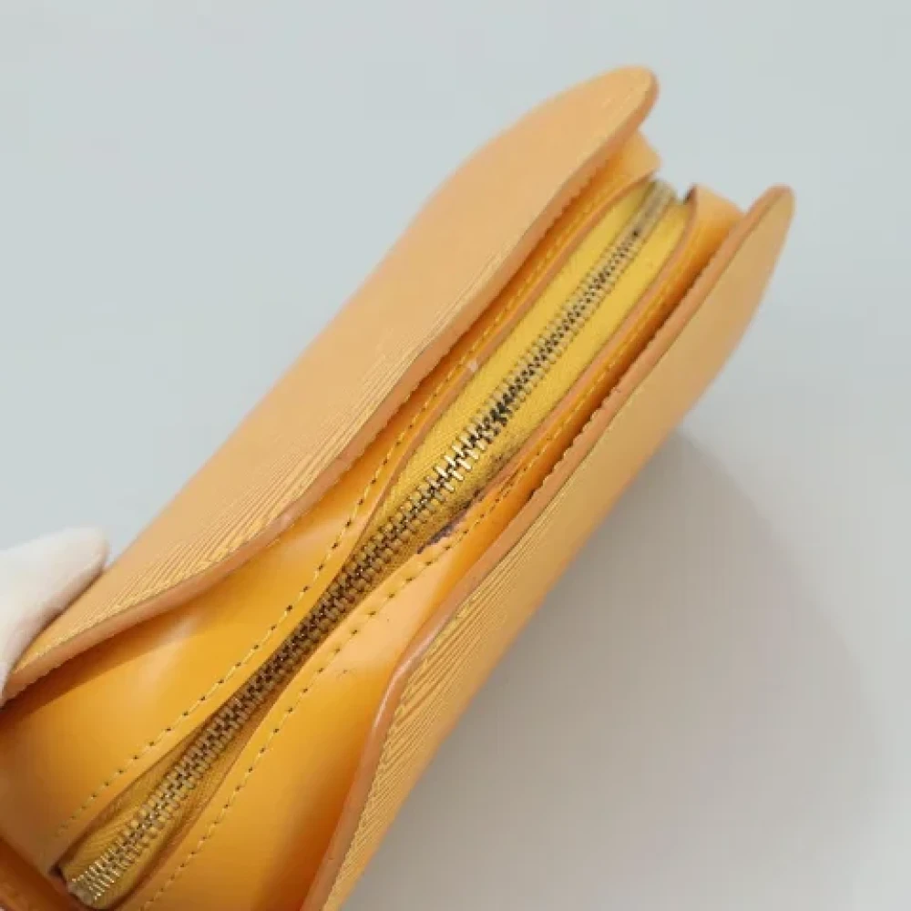 Louis Vuitton Vintage Pre-owned Leather pouches Yellow Dames
