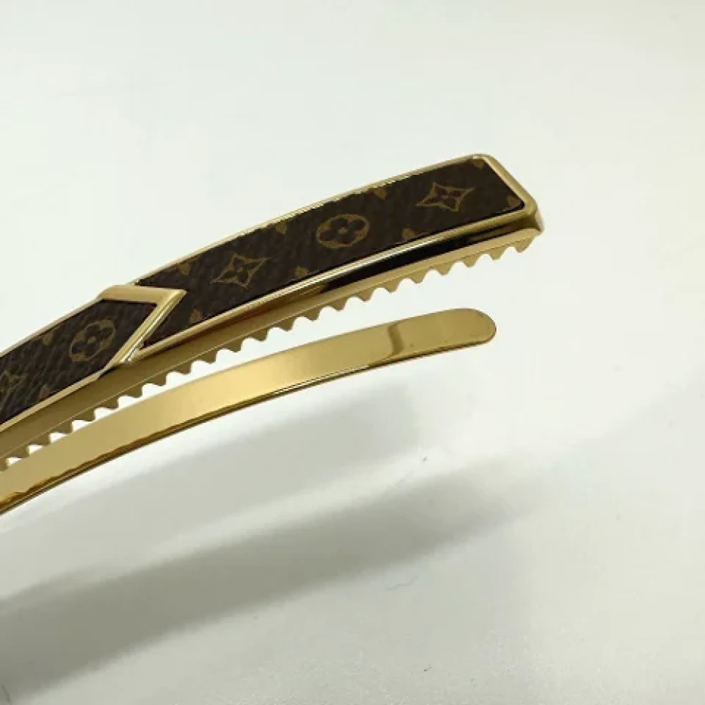 Louis Vuitton Vintage Pre-owned Metal hair-accessories Brown Dames