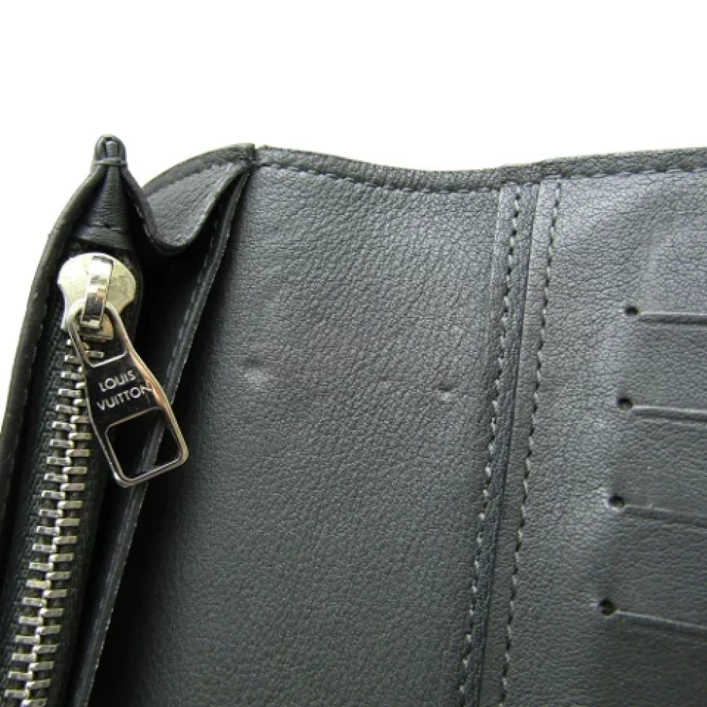 Louis Vuitton Vintage Pre-owned Leather wallets Black Heren