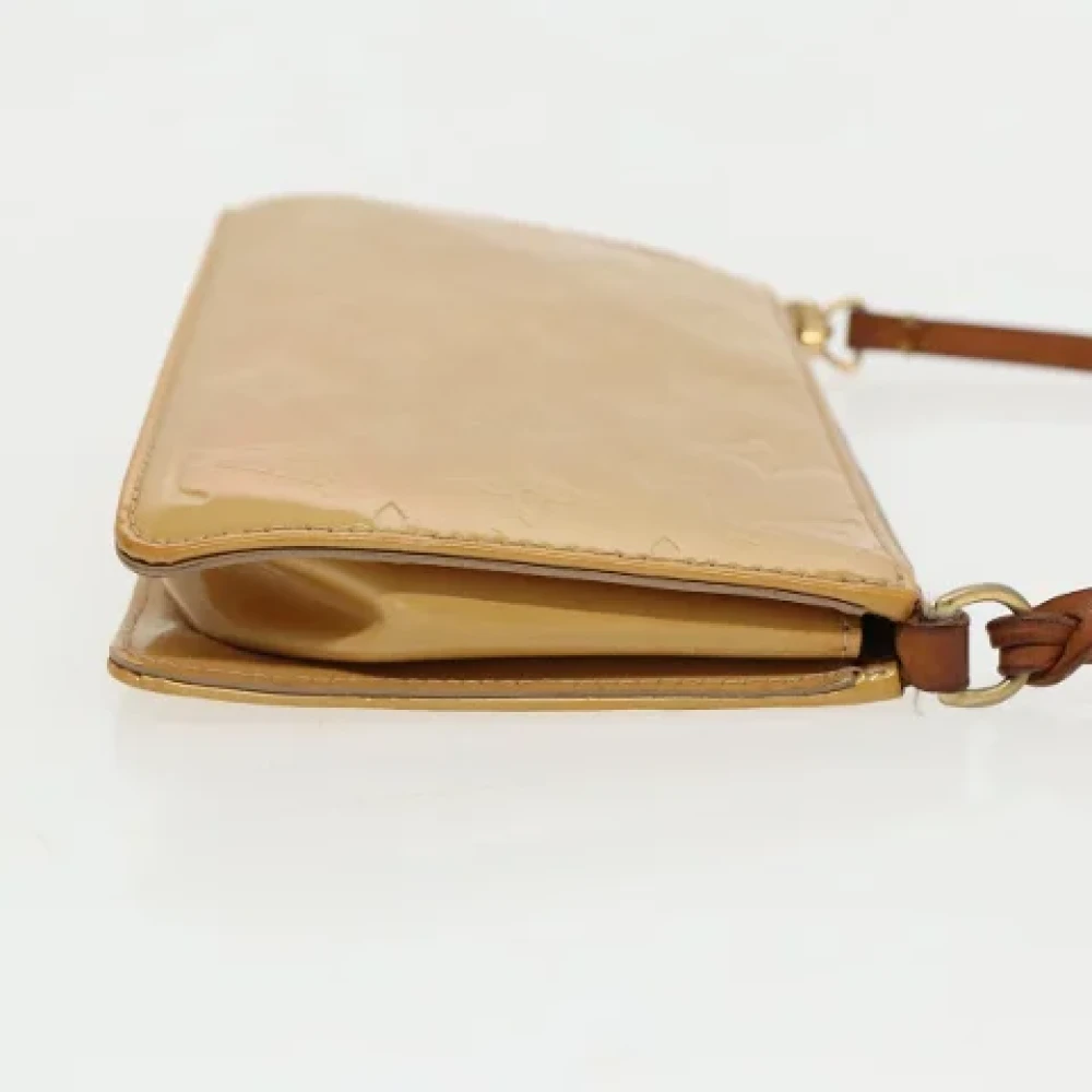 Louis Vuitton Vintage Pre-owned Leather pouches Beige Dames