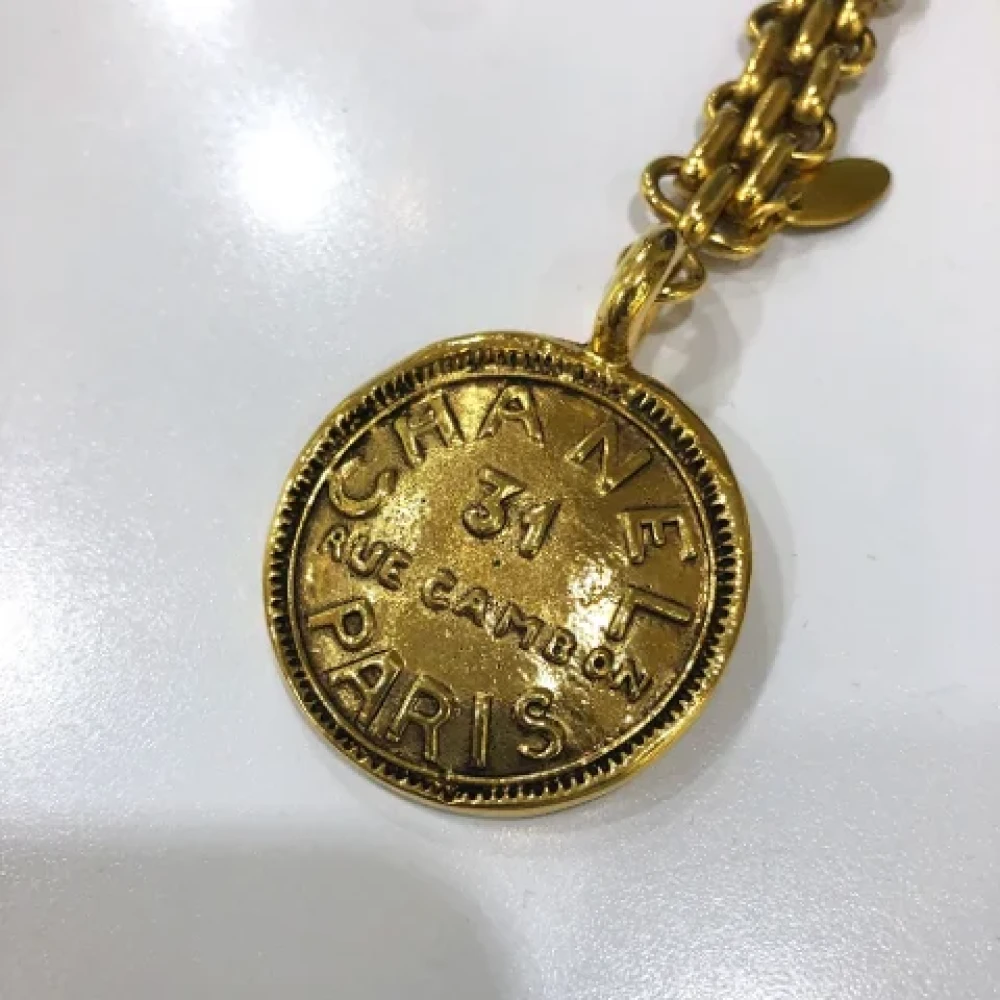 Chanel Vintage Pre-owned Metal key-holders Yellow Dames