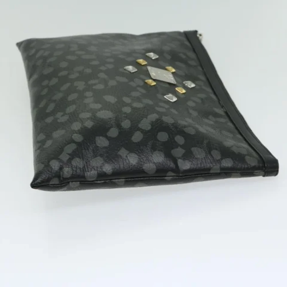 MCM Pre-owned Leather clutches Black Dames