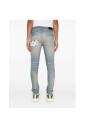 light-blue-ripped-jeans-with-button-fly