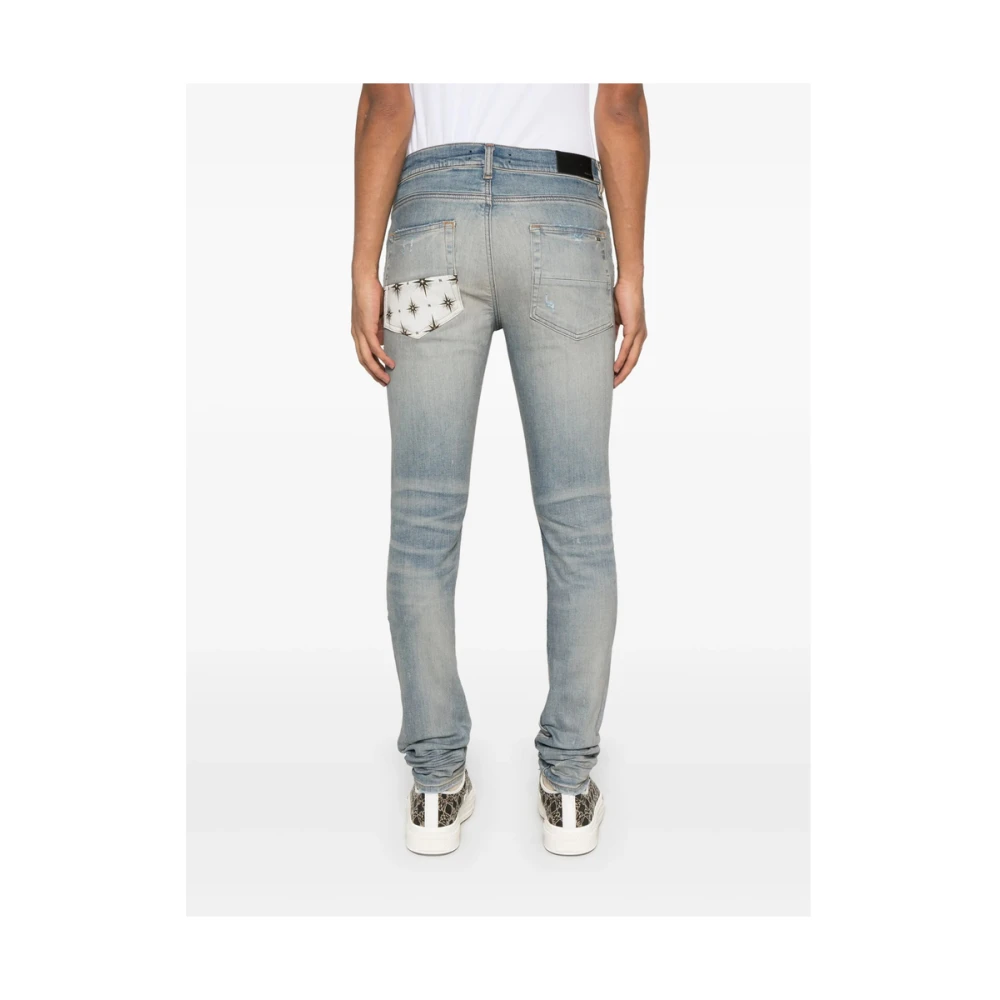 Amiri Lichtblauwe Ripped Jeans met knoopsluiting Blue Heren