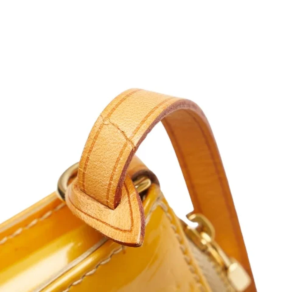 Louis Vuitton Vintage Pre-owned Leather clutches Yellow Dames