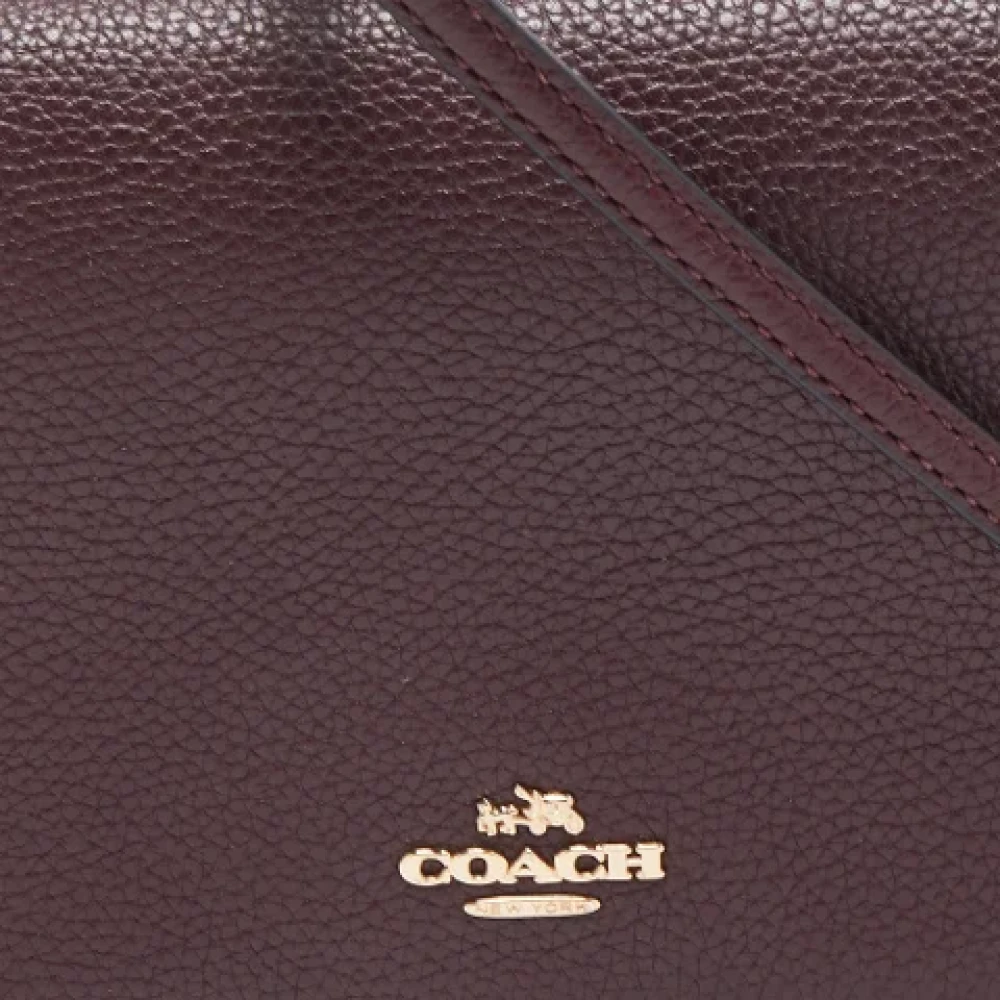 Coach Pre-owned Leather clutches Red Dames