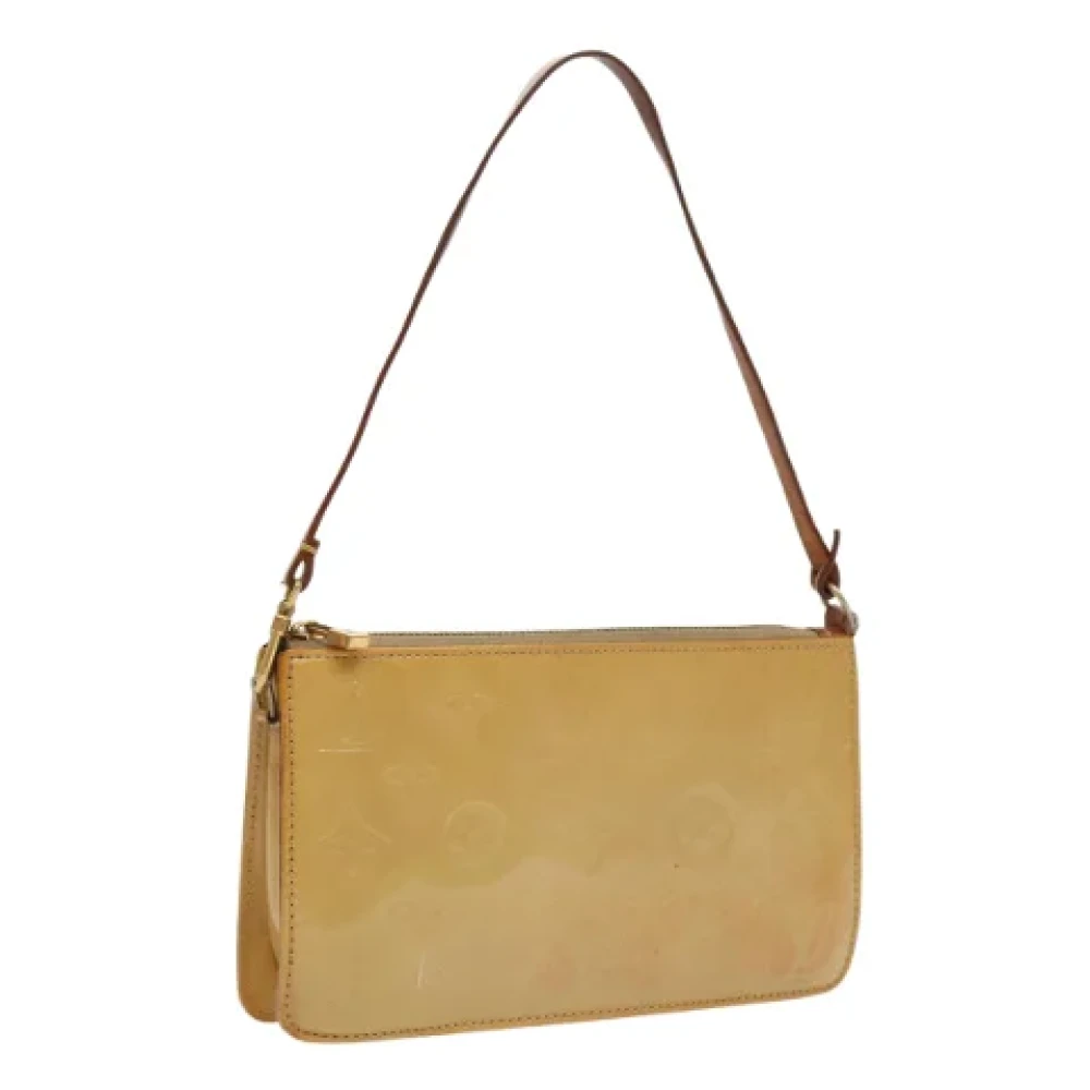 Louis Vuitton Vintage Pre-owned Leather pouches Beige Dames