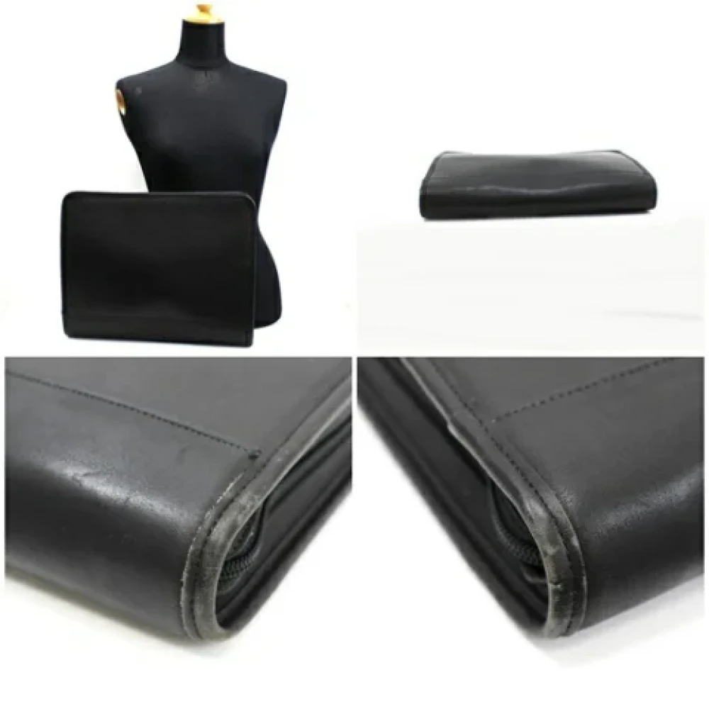 Coach Pre-owned Leather clutches Black Dames