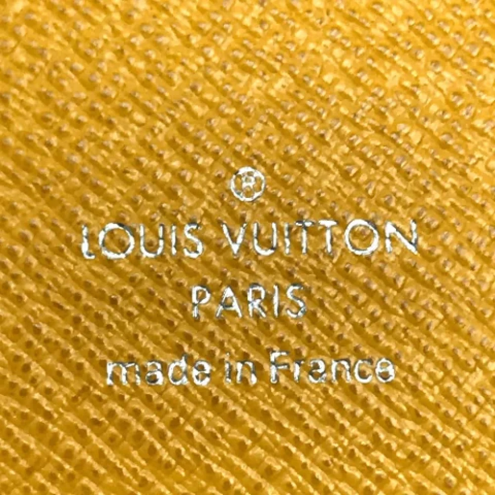 Louis Vuitton Vintage Pre-owned Leather wallets Yellow Heren