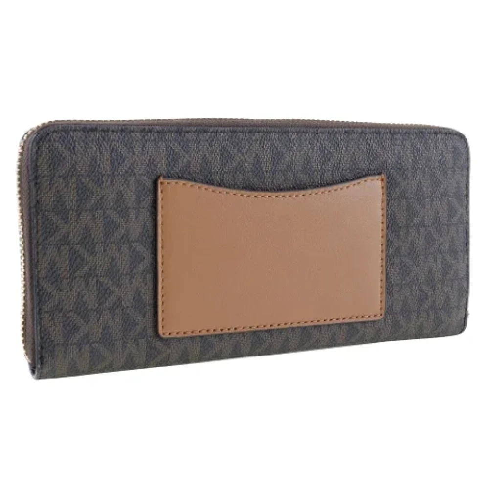 Michael Kors Pre-owned Leather wallets Brown Dames