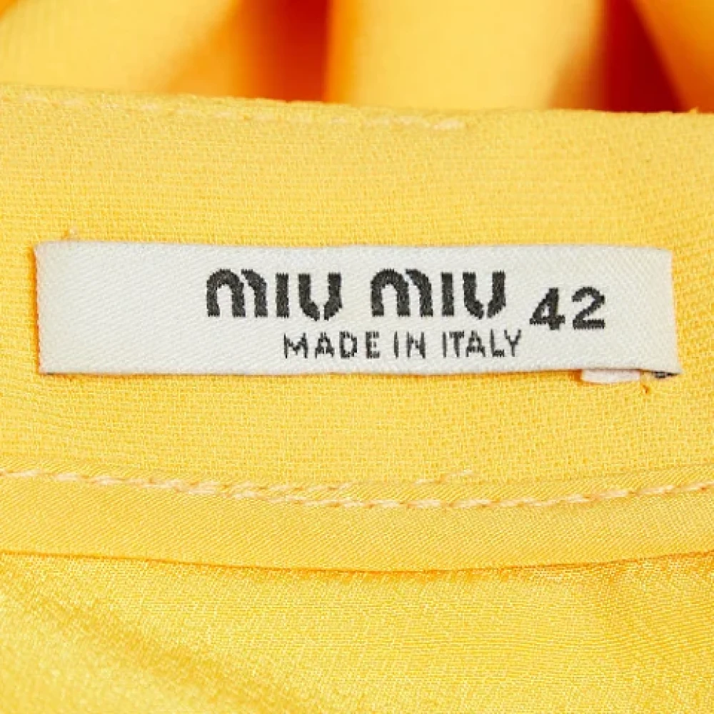 Miu Pre-owned Fabric dresses Yellow Dames