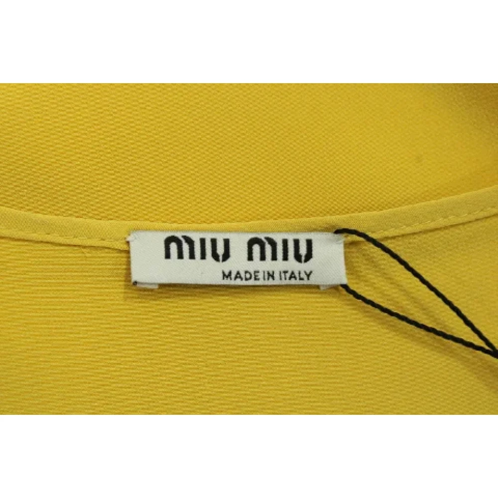 Miu Pre-owned Silk tops Yellow Dames