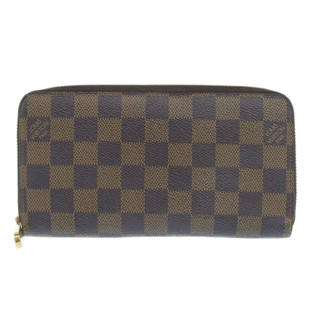 Tweedehands Louis Vuitton Zippy Portemonnee in Bruin Canvas