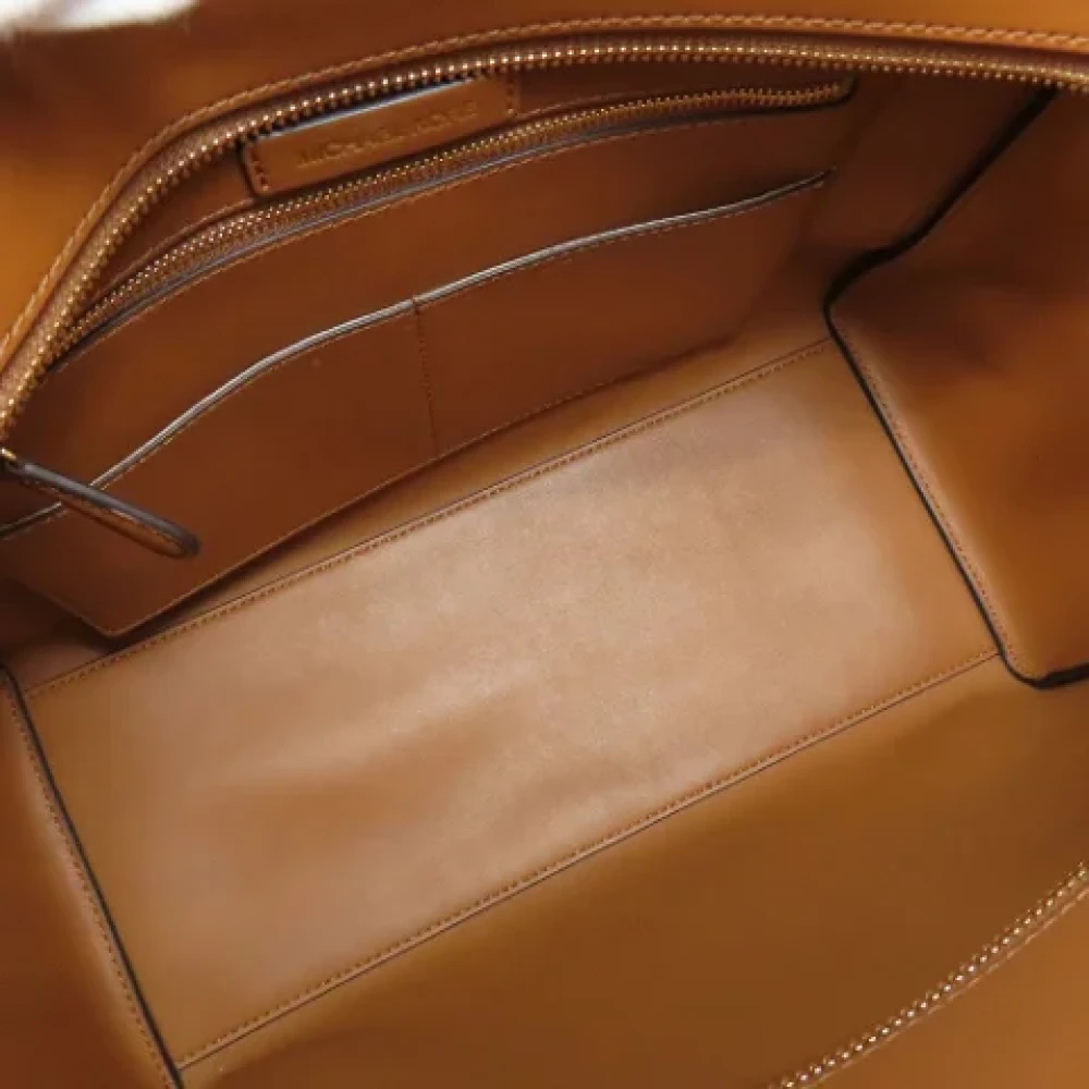 Michael Kors Pre-owned Plastic shoulder-bags Brown Dames