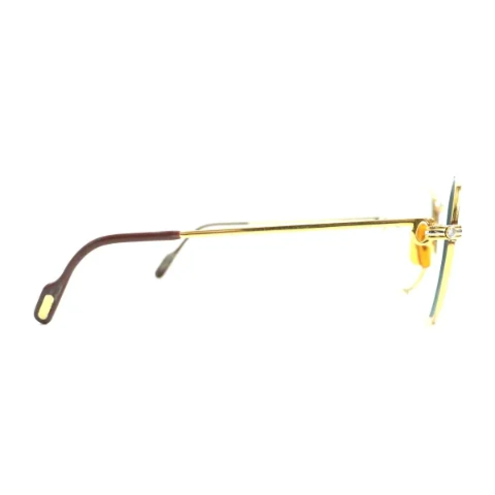 Cartier Vintage Pre-owned Metal sunglasses Yellow Dames