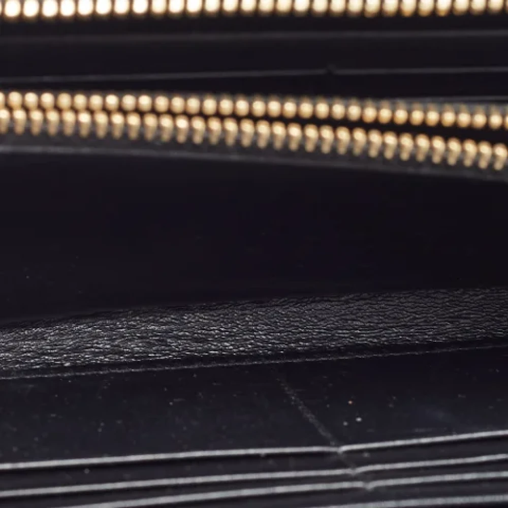 Yves Saint Laurent Vintage Pre-owned Leather wallets Black Dames