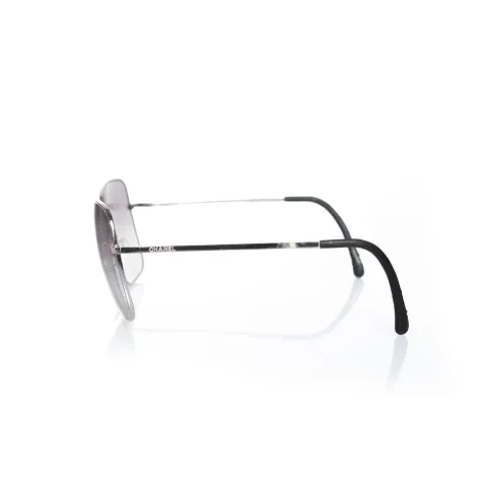 Chanel Vintage Pre-owned Metal sunglasses Gray Dames