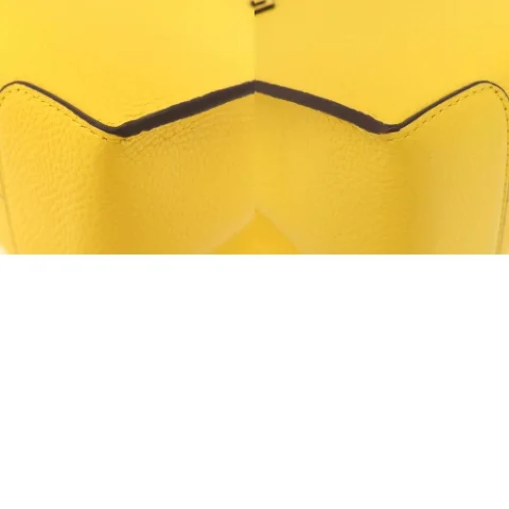 Michael Kors Pre-owned Fabric handbags Yellow Dames
