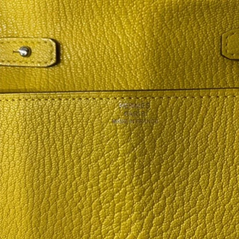 Hermès Vintage Pre-owned Leather clutches Yellow Dames