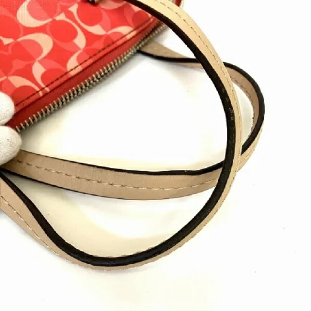 Coach Pre-owned Fabric handbags Pink Dames