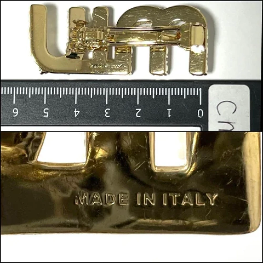 Miu Pre-owned Metal hair-accessories Yellow Dames