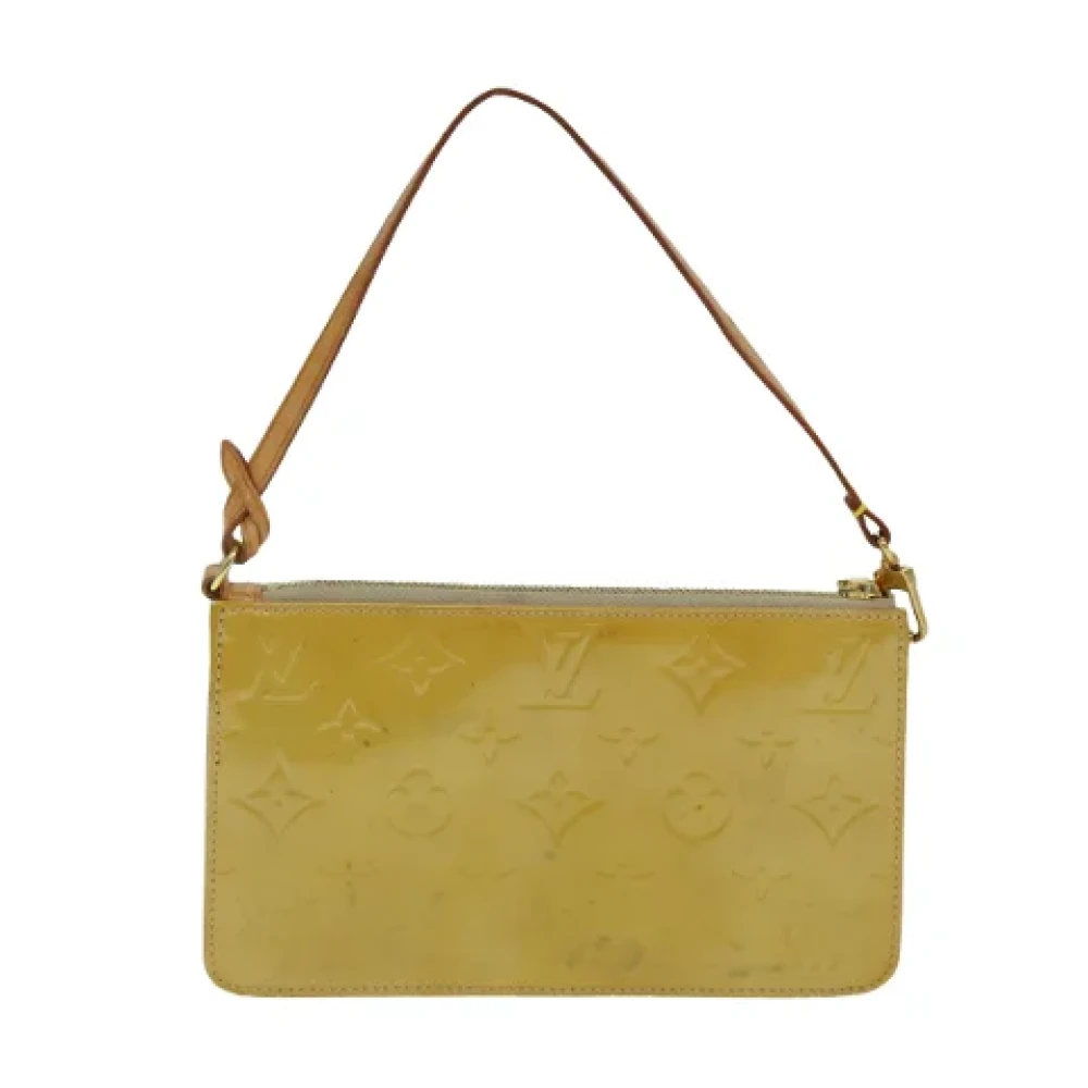 Louis Vuitton Vintage Pre-owned Leather pouches Beige Dames
