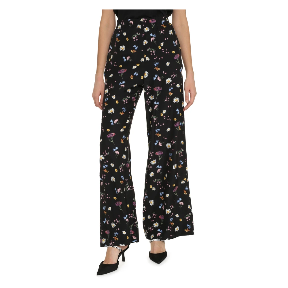 Stella Mccartney Zijden broek met bloemenprint Black Dames