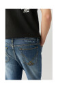 donkere-wassing-tapered-denim-jeans