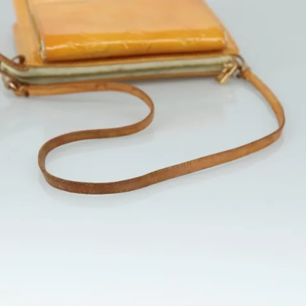 Louis Vuitton Vintage Pre-owned Leather pouches Yellow Dames