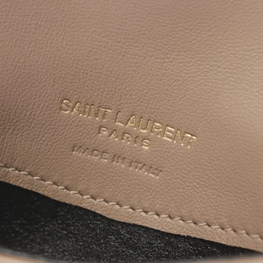 Yves Saint Laurent Vintage Pre-owned Leather wallets Brown Dames