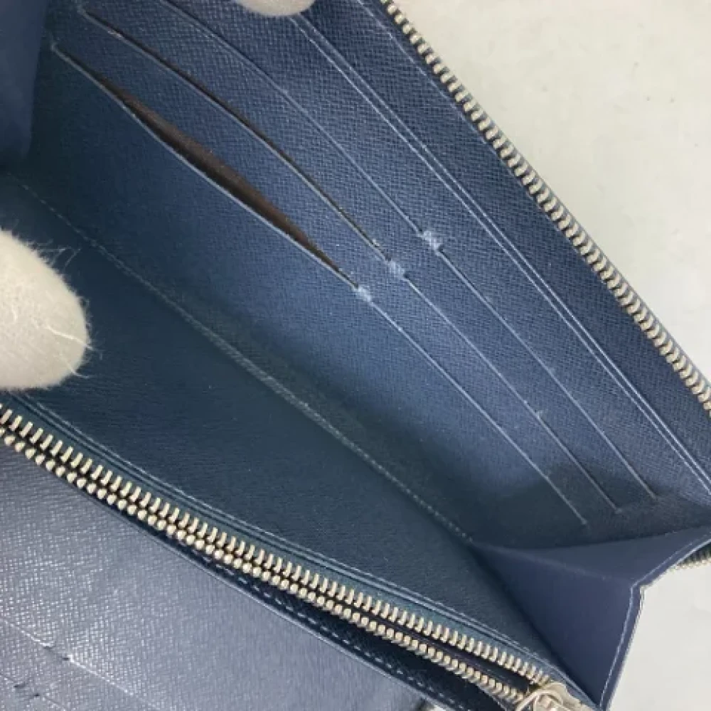 Louis Vuitton Vintage Pre-owned Leather wallets Blue Heren