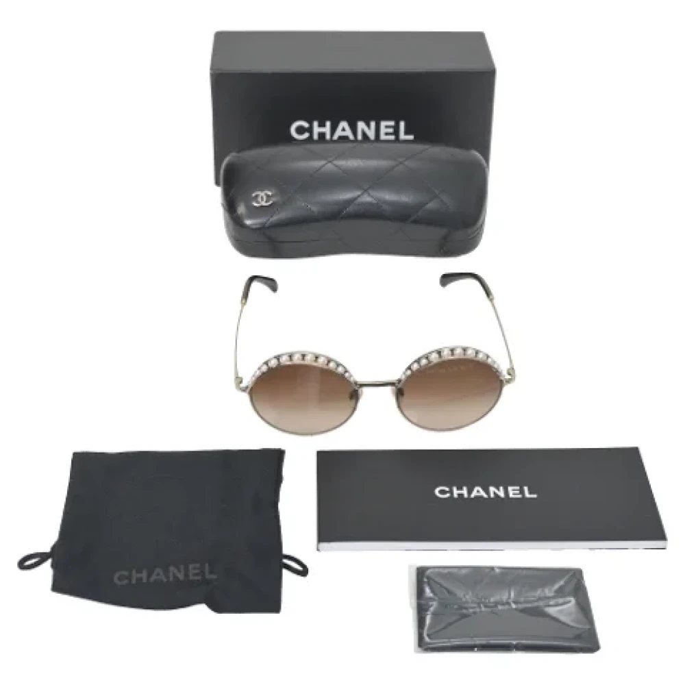 Chanel Vintage Pre-owned Metal sunglasses Yellow Dames