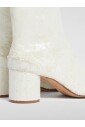 bottines-blanches-a-talon-sculpte