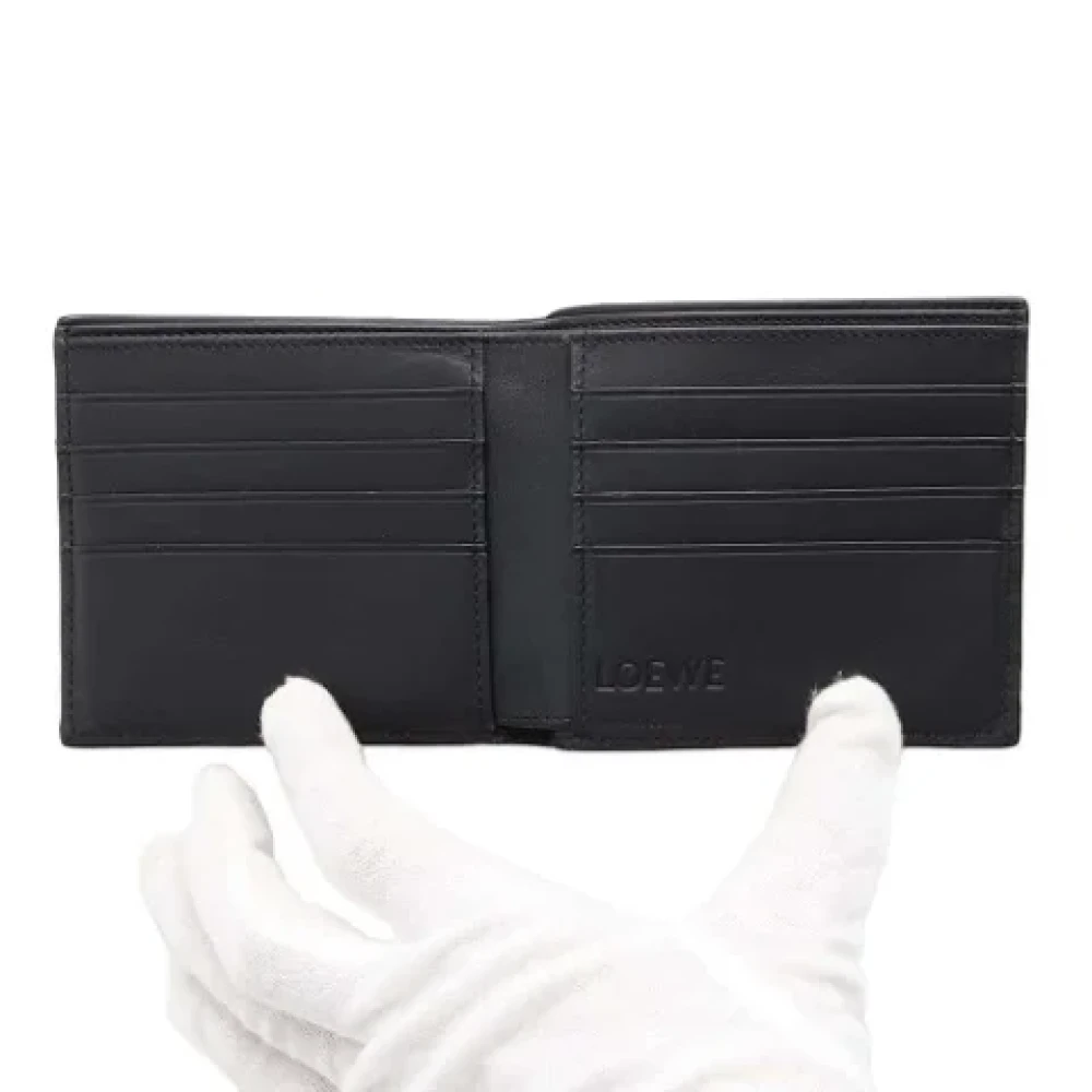 Loewe Pre-owned Leather wallets Brown Heren