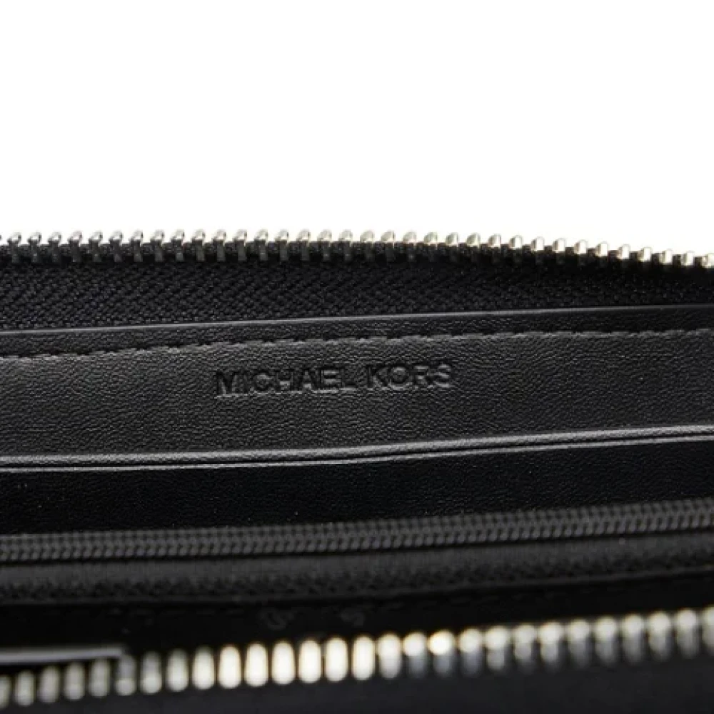 Michael Kors Pre-owned Canvas wallets Black Dames