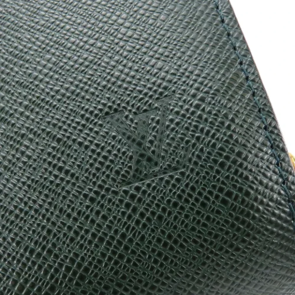 Louis Vuitton Vintage Pre-owned Fabric clutches Green Heren