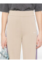 pantalon-beige-avec-broderie-et-rayures