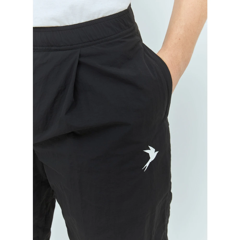66 North Shell Weave Track Pants met Logo Black Heren