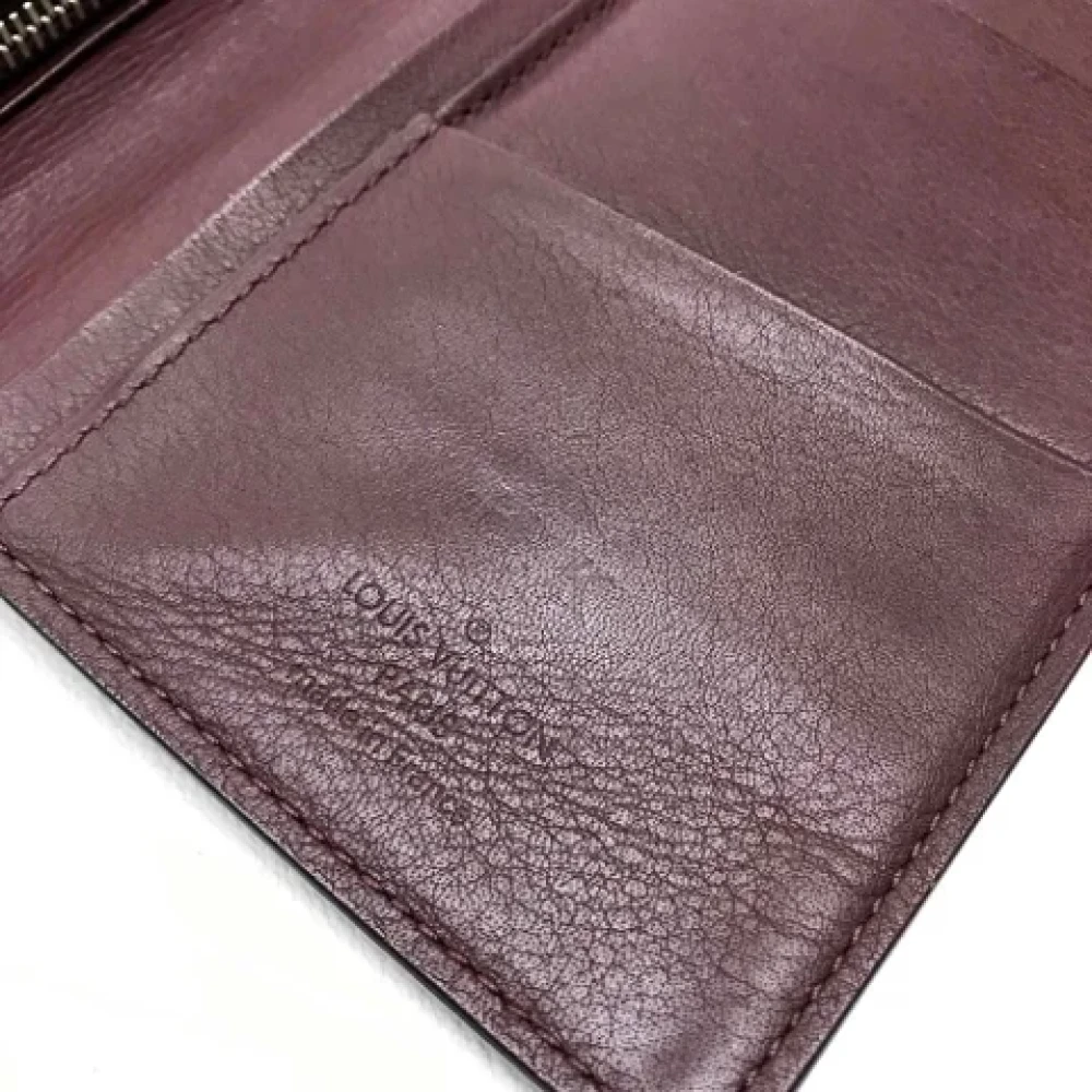 Louis Vuitton Vintage Pre-owned Leather wallets Purple Heren