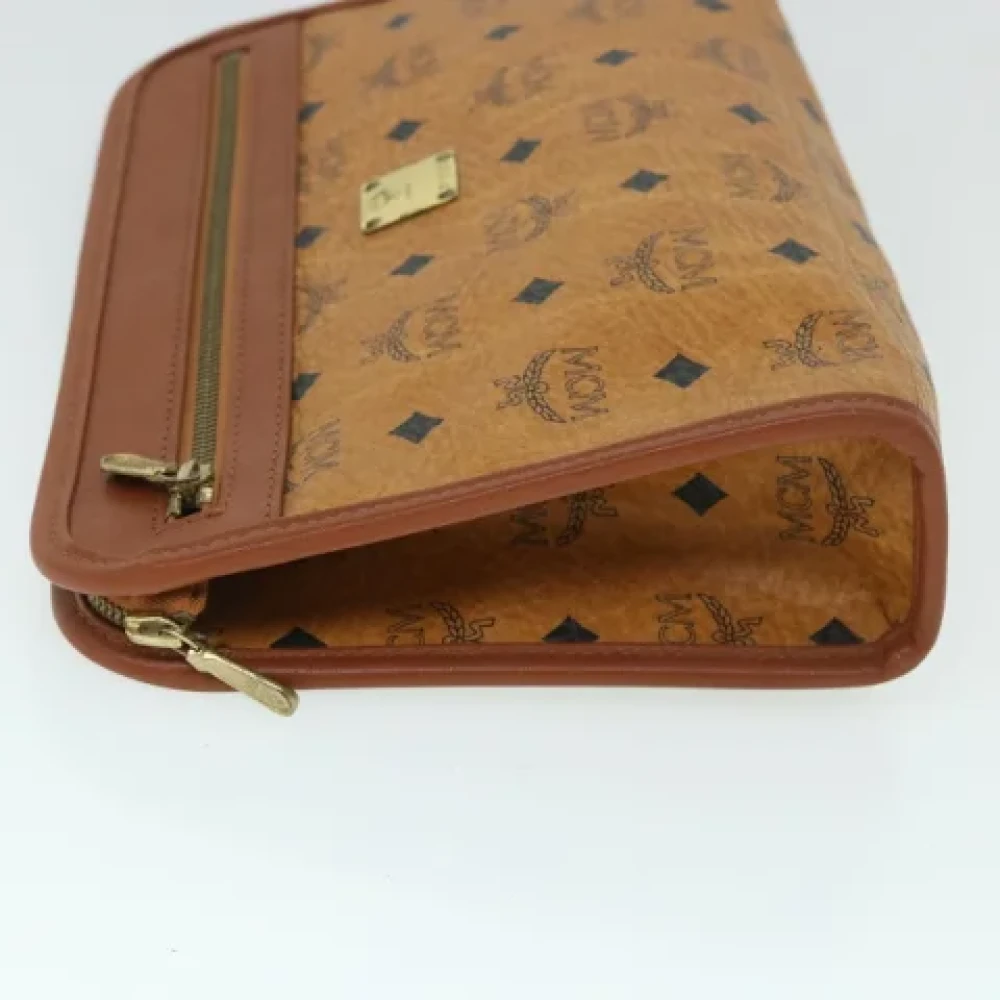 MCM Pre-owned Leather clutches Brown Dames