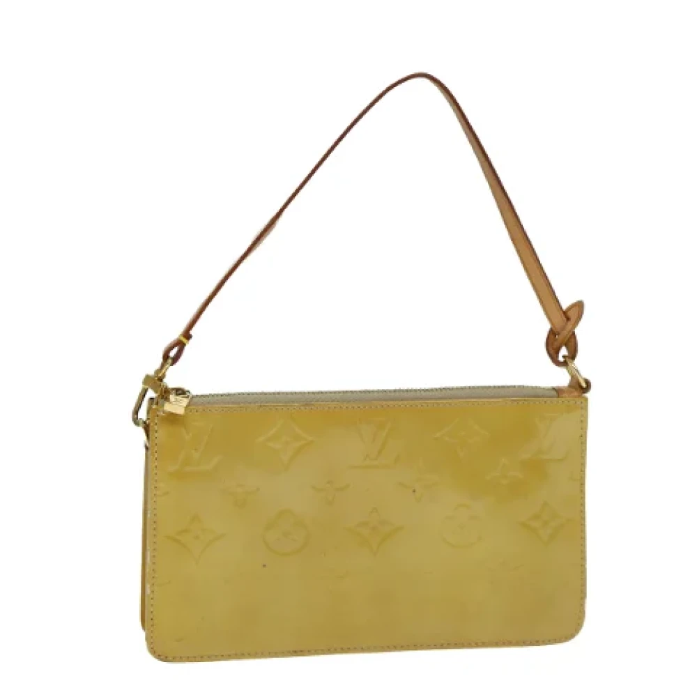 Louis Vuitton Vintage Pre-owned Leather pouches Beige Dames