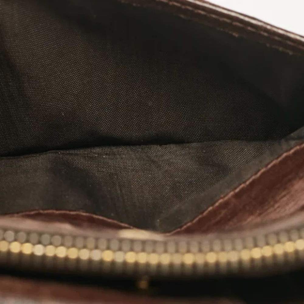 Miu Pre-owned Leather wallets Brown Dames
