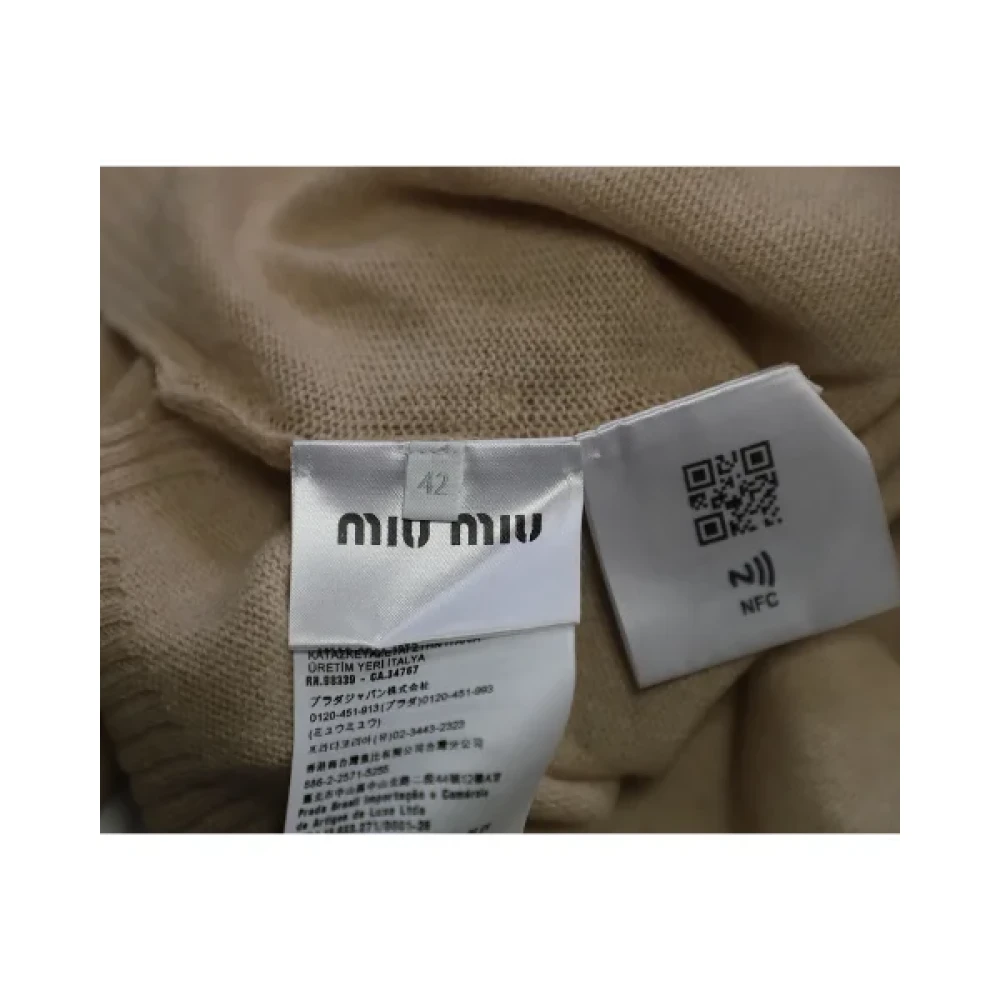 Miu Pre-owned Wool tops Brown Dames