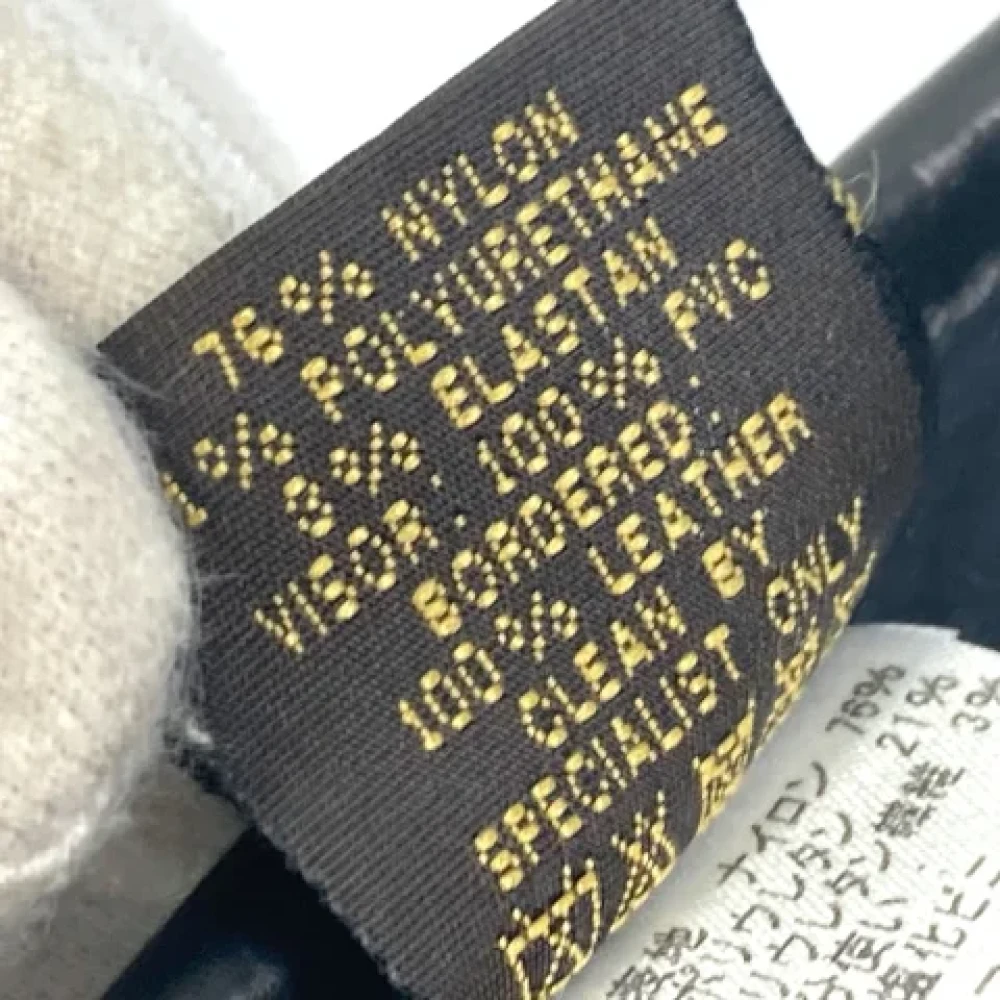 Louis Vuitton Vintage Pre-owned Fabric hats Black Dames